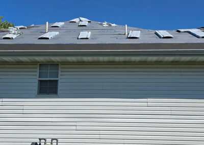 Preparation for a new roof installation showing underlayment on a home in Springfield, MO.